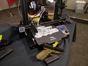 A 3D printer and 3D printed firearms recently seized by Calgary Police.