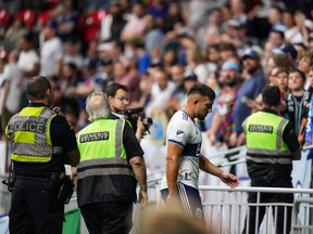 Vancouver Whitecaps' Lucas Cavallini leaves the field after receiving a red card during second half MLS soccer action against Nashville FC in Vancouver last Saturday.