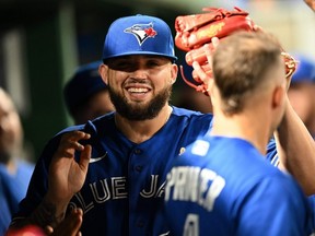 Blue Jays starter Alek Manoah celebrates with teammates after being removed from the game during the eighth inning against the Pirates at PNC Park in Pittsburgh, Friday, Sept. 2, 2022.