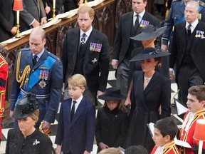 Members of the Royal Family (left to right, from front) the Prince of Wales, Prince George, Princess Charlotte, the Princess of Wales, the Duke of Sussex, the Duchess of Sussex, Peter Phillips, and the Earl of Snowdon, arriving at the State Funeral of Queen Elizabeth II, at Westminster Abbey, London September 19, 2022.