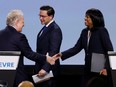 Conservative Party of Canada leadership hopefuls Jean Charest, Pierre Poilievre, and Leslyn Lewis take part in a debate at the Canada Strong and Free Networking Conference in Ottawa, May 5, 2022.