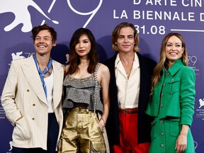 Director Olivia Wilde poses with cast members Harry Styles, Chris Pine, and Gemma Chan for the premiere of her film, "Don't Worry Darling," at the 79th Venice Film Festival in Venice, Italy, Sept. 5, 2022.
