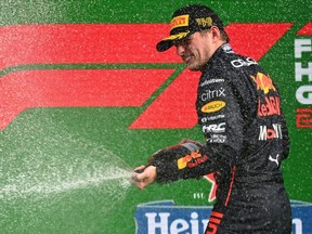 Race winner Max Verstappen of the Netherlands and Oracle Red Bull Racing celebrates on the podium during the F1 Grand Prix of The Netherlands at Circuit Zandvoort in Zandvoort, Netherlands, Sunday, Sept. 4, 2022.
