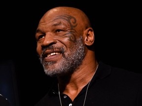 In this file photo taken on November 05, 2021 Mike Tyson attends the weigh-in for boxers Canelo Alvarez and Caleb Plant at MGM Grand Garden Arena in Las Vegas, Nevada.