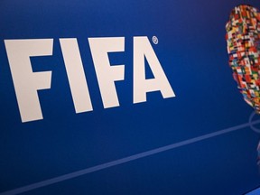 This file photo taken on February 15, 2019 shows the FIFA logo during a press conference held by the president of the football's governing body at the FIFA Executive Football Summit in Istanbul.