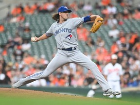 Sep 5, 2022; Baltimore, Maryland, USA; Toronto Blue Jays starting pitcher Kevin Gausman throws a first inning pitch against the Baltimore Orioles at Oriole Park at Camden Yards.