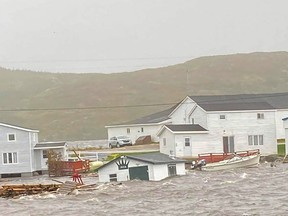 This Sept. 24, 2022, image courtesy of Michael King, special advisor to Newfoundland and Labrador Premier Andrew Furey, and his family, shows damaged caused by post-tropical storm Fiona on the Burnt Islands in Newfoundland and Labrador.