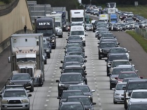 Traffic moves slowly on I-4 East as residents evacuate the Gulf Coast of Florida in advance of the arrival of Hurricane Ian on Sept. 27, 2022 in Four Corners, Fla.