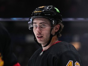 Vancouver Canucks' Quinn Hughes lines up for a faceoff against the Seattle Kraken during the second period of an NHL hockey game in Vancouver, on Tuesday, April 26, 2022. All these years later, and on the heels of an encouraging first act, the young blue-liner is keen to see what's in store for the Canucks with a full season of coach Bruce Boudreau at the helm.