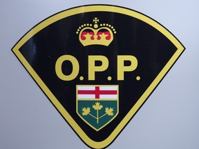 An Ontario Provincial Police logo is shown during a press conference in Barrie, Ont., on Wednesday, April 3, 2019.