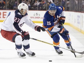 Columbus Blue Jackets defenceman Ryan Murray (27) skates against New York Islanders right wing Cal Clutterbuck (15) during an NHL game, Saturday, Nov. 30, 2019, in New York.