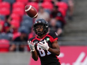 Ottawa Redblacks wide receiver Terry Williams (81) makes a catch from a Montreal Alouettes' punt during first half CFL action in Ottawa on Thursday, July 21, 2022. Williams has been sent to the B.C. Lions in a trade with the Redblacks.