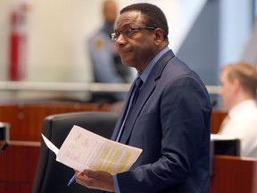 Michael Thompson speaks during a city council meeting in Toronto on March 27, 2019.