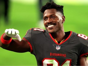 Antonio Brown of the Tampa Bay Buccaneers reacts as he heads off the field following a game against the Los Angeles Rams at Raymond James Stadium on November 23, 2020 in Tampa, Florida.