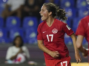 Canada's Jessie Fleming celebrates scoring her side's opening goal against Jamaica during a CONCACAF Women's Championship soccer semifinal match in Monterrey, Mexico, Thursday, July 14, 2022.