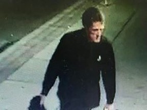 An image released by Toronto Police of a suspect in the assault of a woman Oct. 10, 2022 on Yonge St. near Wellesley St.