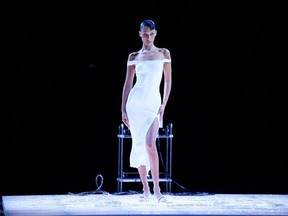 Bella Hadid is dressed by spraying foam during the Coperni Spring-Summer 2023 fashion show as part of the Paris Womenswear Fashion Week, in Paris, Friday, Sept. 30, 2022.