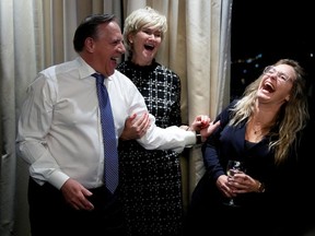 Quebec Premier Francois Legault and his wife Isabelle Brais attend an election night rally in Quebec City, Quebec, Canada, Oct. 3, 2022.