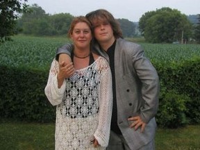 Michelle "Mimi" Barnoski is pictured with her son, Cody, after his Grade 8 graduation. Cody was 14 when he killed his mom with eight gunshot blasts to the head, and now he's free on parole.