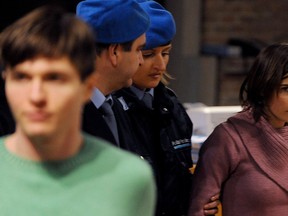 US student Amanda Knox (R) and Italian student Raffaele Sollecito arrive for the hearing of their appeal trial in Perugia's courthouse on December 18, 2010. (TIZIANA FABI/AFP via Getty Images)