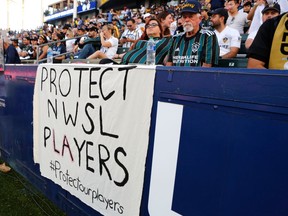 Signage supporting NWSL players is seen during a game between the Los Angeles Galaxy and the Los Angeles FC at Dignity Health Sports Park on October 03, 2021 in Carson, California. (Photo by Katharine Lotze/Getty Images)
