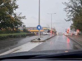 A train crashes into a bus on a railway crossing in Bergen op Zoom, Netherlands, Oct. 17, 2022 in this screen grab taken from a handout video.