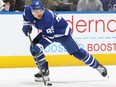 Nick Robertson of the Maple Leafs skates with the puck against the Kraken at Scotiabank Arena in Toronto, March 8, 2022.