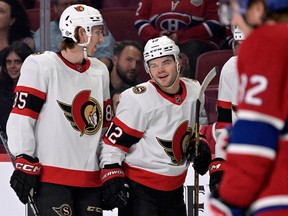 Ottawa Senators forward Alex Debrincat (12) celebrates with teammates after scoring a goal against the Montreal Canadiens during the first period at the Bell Centre.