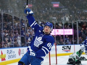 Oct 20, 2022; Toronto, Ontario, CAN; Toronto Maple Leafs left wing Nicholas Robertson (89) scores a goal and celebrates against the Dallas Stars during the third period at Scotiabank Arena.
