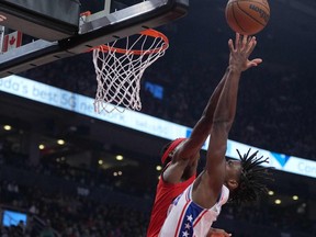 Philadelphia 76ers guard Tyrese Maxey moves to the basket as Toronto Raptors forward Precious Achiuwa tries to defend during the second quarter at Scotiabank Arena in Toronto, Oct. 28, 2022.
