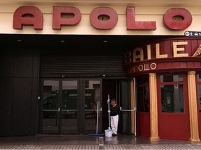 A cleaner is seen outside Apolo, a Barcelona concert hall and night club. Staff from the Apolo found the body of a young man on Wednesday whom the police identified as Australian rugby player Liam Hampson. Barcelona, Spain, October 20, 2022