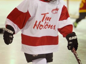 Tim Hortons is halting support of Hockey Canada's men's program.