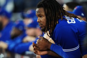 Blue Jays first baseman Vladimir Guerrero Jr. looks on from the dugout as they face the Seattle Mariners during ninth inning on Saturday, Oct. 8, 2022.