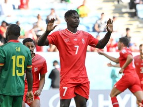 Switzerland Breel Embolo does a muted celebration after scoring his team's first goal against Cameroon.