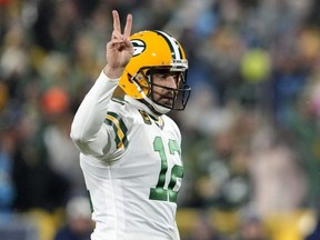 Packers quarterback Aaron Rodgers calls for a two-point conversion after a touchdown against the Titans during NFL action at Lambeau Field in Green Bay, Wisconsin on November 17, 2022.
