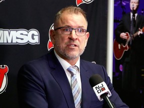 General manager Tom Fitzgerald of the New Jersey Devils announces a contract extension for Jack Hughes prior to the game against the San Jose Sharks at the Prudential Center on November 30, 2021 in Newark, New Jersey.