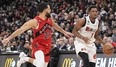 Miami Heat guard Kyle Lowry (7) tries to dribble around Toronto Raptors guard Fred VanVleet (23) during the first half at Scotiabank Arena.