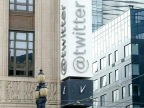 The Twitter sign is seen on the exterior of Twitter headquarters in San Francisco, Oct. 28, 2022.
