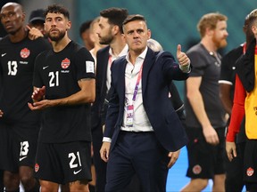 Canada coach John Herdman gives the thumbs up after losing to Croatia at the World Cup yesterday.
