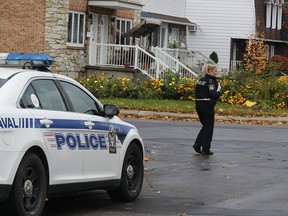Laval police investigate after two children were found dead in a home in the Ste-Dorothée district Oct. 17, 2022.