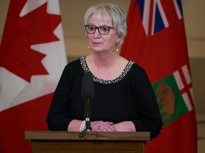 Eileen Clarke, minister of municipal relations, speaks to the media at a press conference at the Manitoba Legislative Building in Winnipeg, Manitoba on Tuesday Jan. 18, 2022. Clarke said public consultations are to begin early next year for the province to move to permanent daylight time.