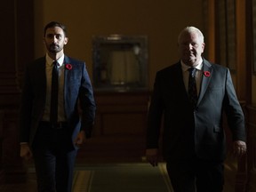 Ontario Premier Doug Ford (right) and Education Minister Stephen Lecce attend a news conference at the legislature in Toronto, Tuesday, Nov. 8, 2022, as the government engages in further talks with the union representing 55,000 education workers.