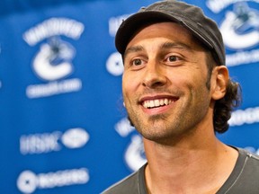 File photo: Former Vancouver Canuck goalie Roberto Luongo speaks to the media during a press conference at Rogers Arena on Sept. 13, 2010.