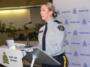 RCMP spokesperson Cpl. Julie Courchaine addresses the media at a press conference at RCMP D Division headquarters in Winnipeg on Saturday, Nov. 26, 2022. RCMP are searching for a 62-year-old Winnipeg man who is wanted on kidnapping, forcible confirnement and abduction of a minor charges after RCMP said he forced a 25-year-old woman to drive him from Portage la Prairie to Winnipeg on Friday with her two-year-old daughter in the woman's vehicle.