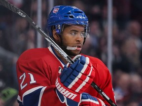Montreal Canadiens right wing Devante Smith-Pelly adjusts his glove during the first period of the Canadiens NHL hockey match against the Ottawa Senators at the Bell Centre in Montreal on Thursday, March 12, 2015.