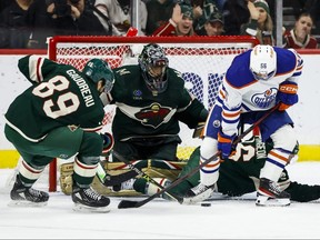 Marc-Andre Fleury of the Minnesota Wild defends his net against Kailer Yamamoto of the Edmonton Oilers in the third period of the game at Xcel Energy Center on Dec. 12, 2022 in St Paul, Minn.