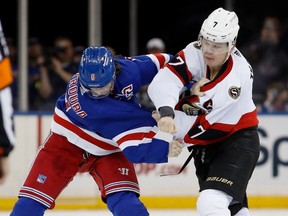 Brady Tkachuk of the Senators and Jacob Trouba of the Rangers fight during the second period. Tkachuk also had an assist and two goals for Ottawa on Friday night.