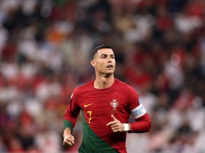 Cristiano Ronaldo of Portugal looks on during the FIFA World Cup Qatar 2022 Round of 16 match between Portugal and Switzerland at Lusail Stadium on December 06, 2022 in Lusail City, Qatar.