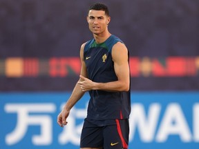 Cristiano Ronaldo of Portugal looks on during the Portugal Training Session at Al Shahaniya SC Training Site on December 09, 2022 in Doha, Qatar.