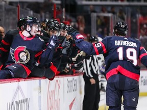 Drake Batherson celebrates with Senators teammates on the bench after scoring a second-period goal against the Canadiens on Wednesday.